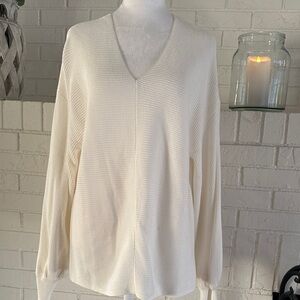 1. State Cream V-Neck Sweater